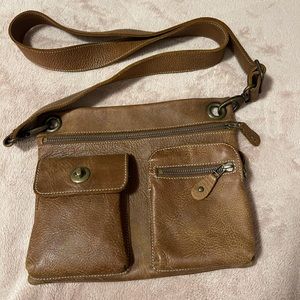Roots Canada Village crossbody bag in Tribe Africa